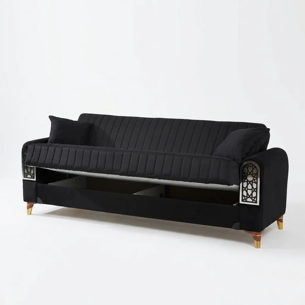 Black sofa with decorative armrests on a white background