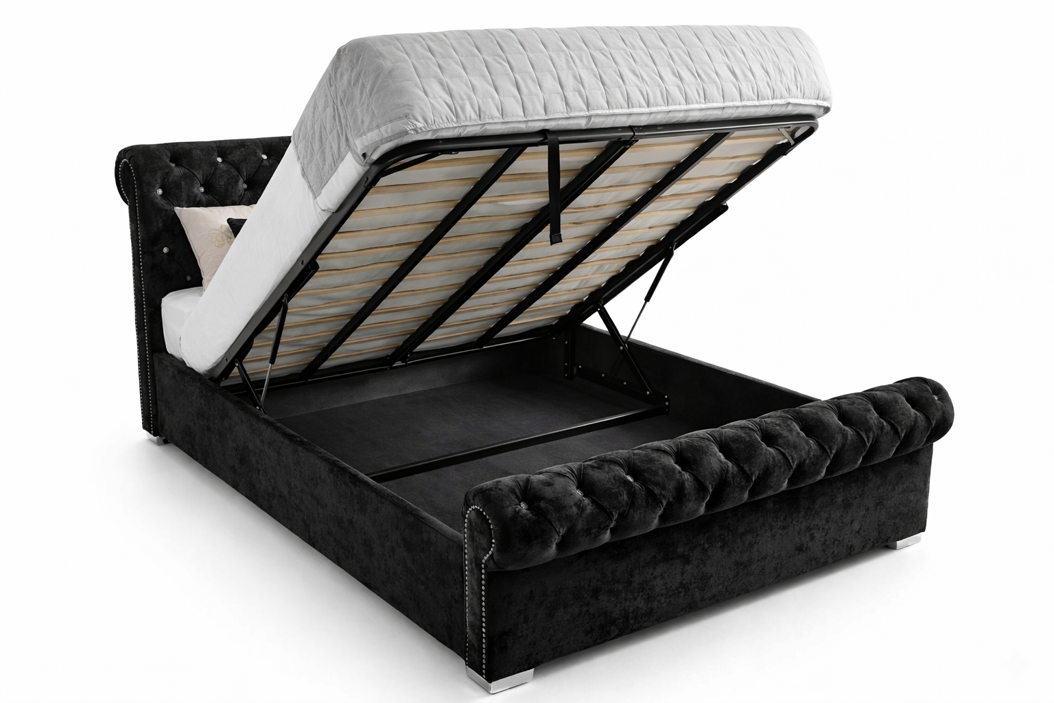 Black upholstered bed with open storage compartment on a white background