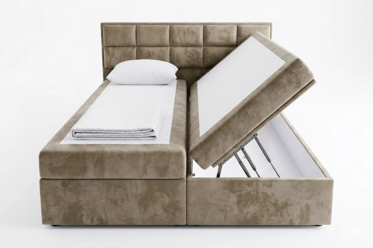 Beige upholstered bed with storage compartments on a white background