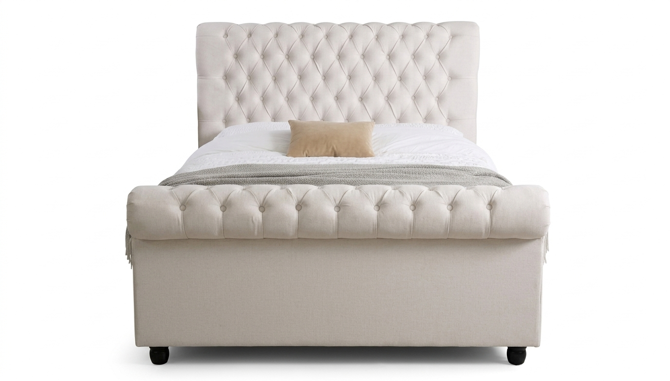 Beige upholstered bed with tufted headboard on a white background