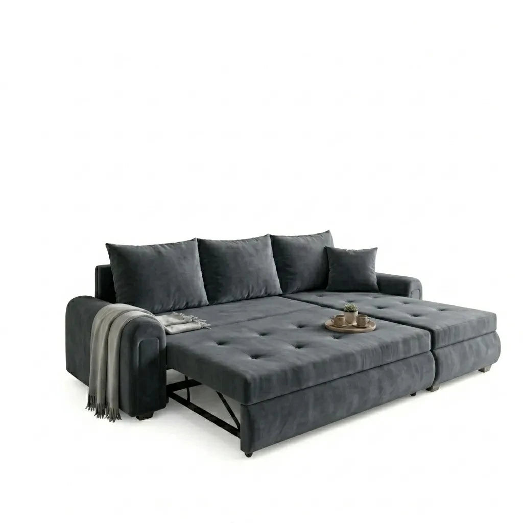 Gray sectional sofa with ottoman on a white background