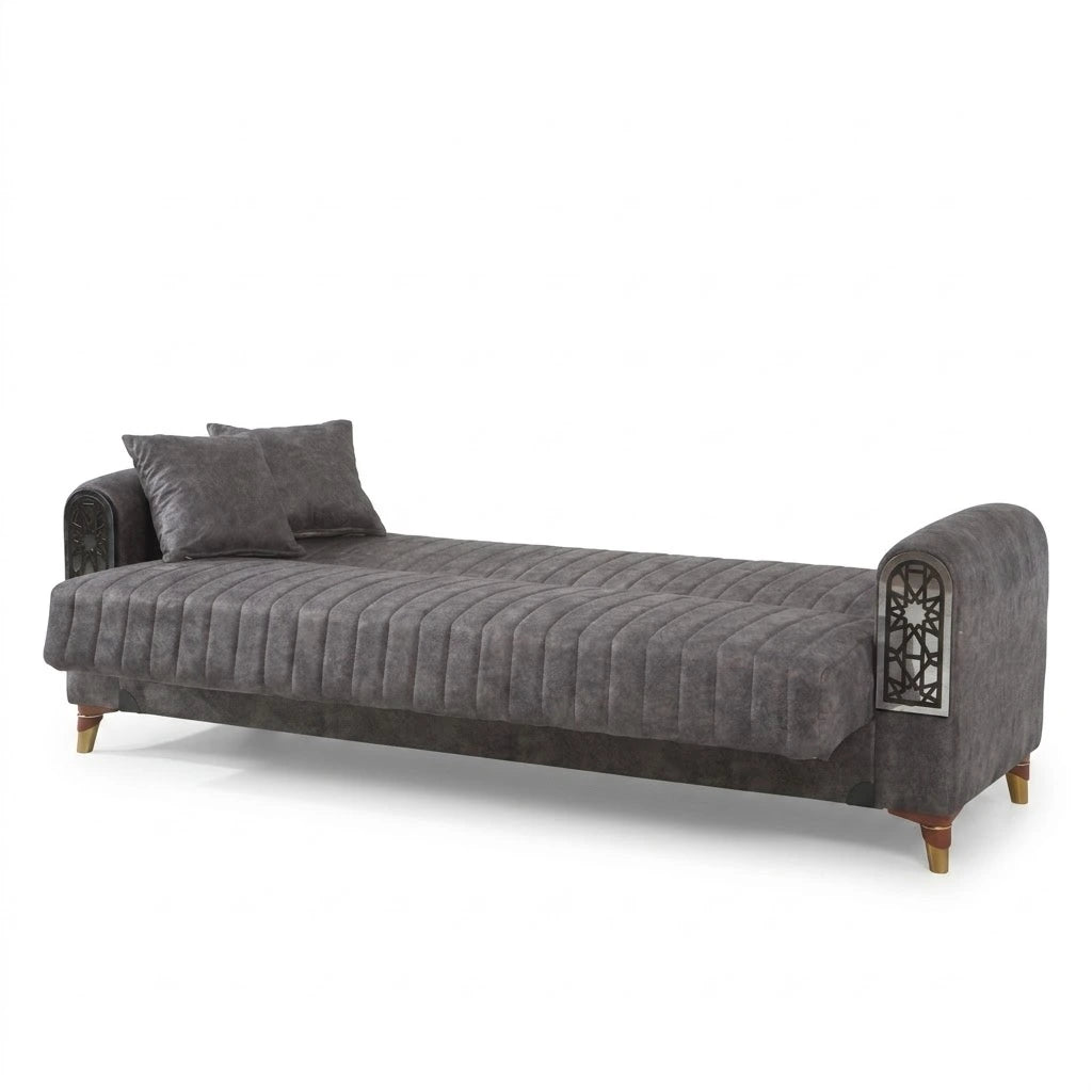 Gray upholstered chaise lounge with decorative armrests on a white background