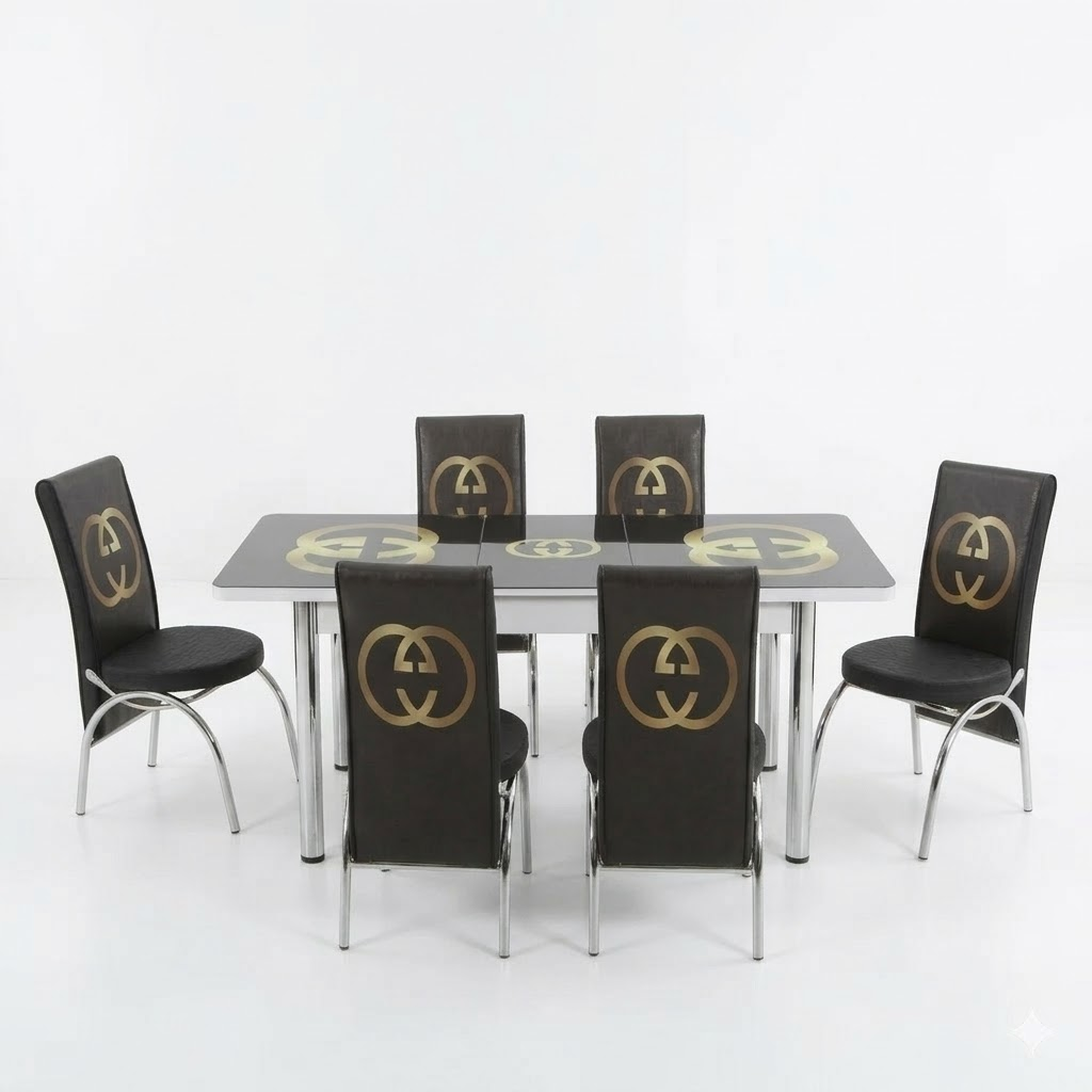 Dining table set with black chairs featuring pumpkin design on a white background