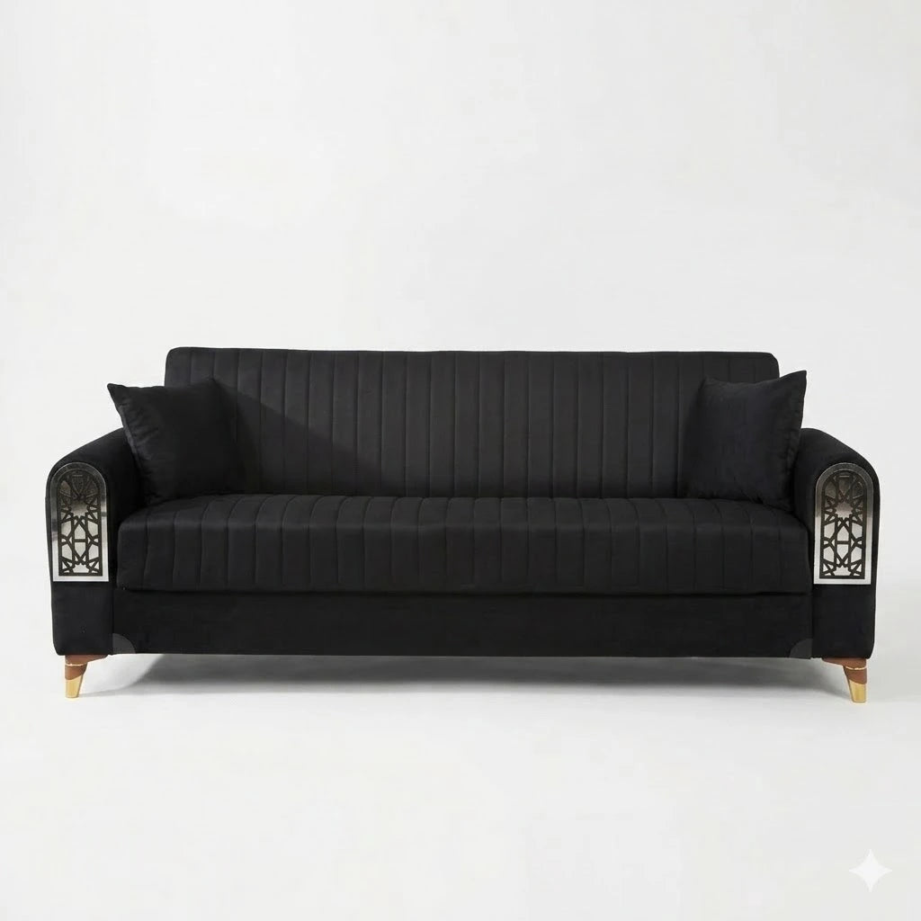 Black sofa with decorative armrests on a white background