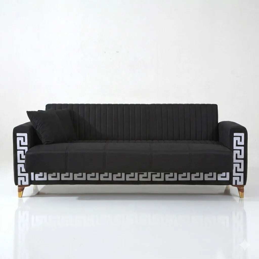 Black sofa with decorative pattern on a white background